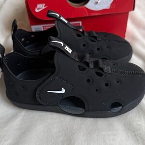 Nike Black Perforated Slip-Ons